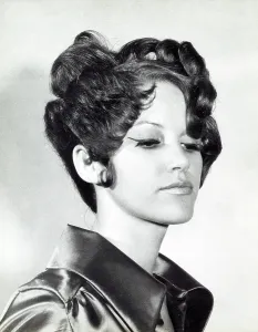 Curl Prints: A model with hair coiffured with an elaborate curl effect