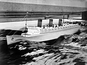 Experimental Prints: Model of the R. M. S. Queen Mary in a test tank, 1934