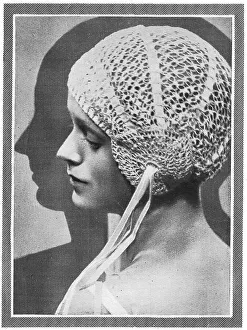 New Images July 2023 Collection: Model wearing close-fitting crocheted bourdoir cap Date: 1929