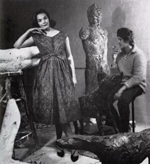 Modelling Gallery: Model wearing a cotton dress by Sambo, visits Elisabeth Frink, the sculptor in her studio