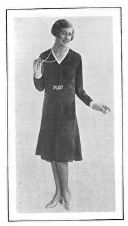 Frock Collection: Model wearing a short-skirted afternoon frock and a string of pearl beads Date: 1930