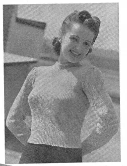 Garter Prints: Model wearing a tight knitted sweater in a diamond pattern of rib and garter stitch
