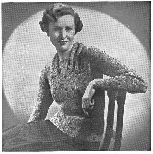 New Images July 2023 Collection: Model wearing a tweedy knitted jumper Date: 1936