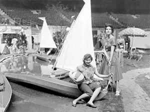 Displaying Prints: Models displaying a sailing dinghy