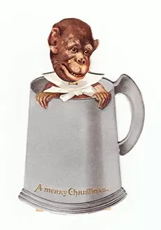 Images Dated 16th November 2015: Monkey in a tankard on a movable Christmas card