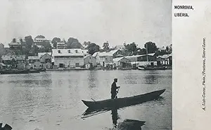 Waterfront Prints: Monrovia, Liberia - Dugout canoe on the Mesurado River