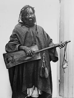 Moorish musician with instrument