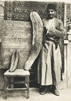 Mosul, Iraq - Iraqi man with his giant Cornichon