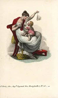 Amour Gallery: Mother breastfeeding her child on her lap