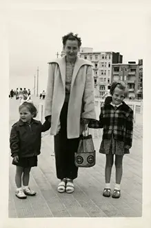 Mother and two children - Street Photograph - Belgium
