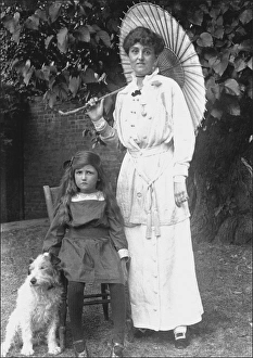 Mother, daughter and pet dog