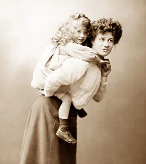 Mother and daughter piggyback