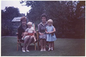 Images Dated 4th February 2021: Mother, her daughter and two other young relatives - garden