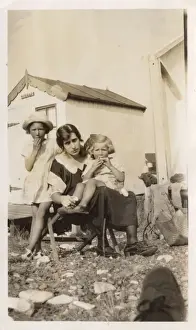 Shingle Prints: Mother and two daughters having lunch near their beach hut