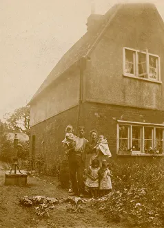 Patch Prints: Mother, Father and children pose in their kitchen garden