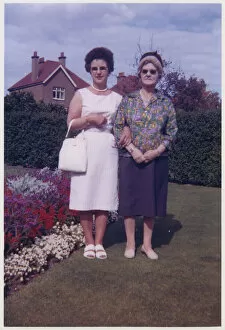 Insert Collection: Mother and Grandmother in a neat suburban back garden