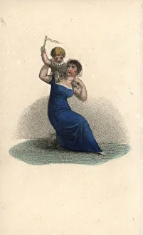 Amour Gallery: Mother playing the flying angel game with a baby