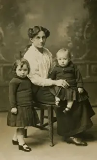 Mother and two small children
