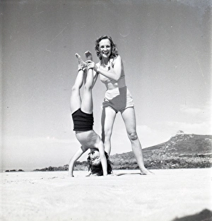 Images Dated 2nd September 2016: Mother and son doing handstand