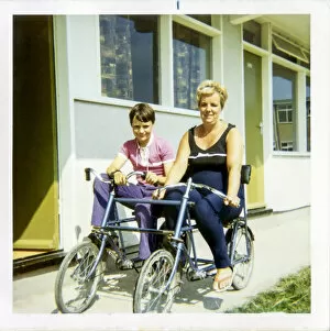 Nov15 Gallery: Mother and Son on a Quadricycle at a Holiday Camp