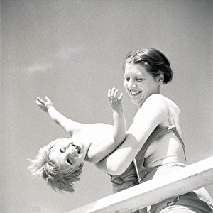 Woman and child at the seaside