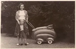 Perambulator Prints: Mother and son with a streamlined Pram