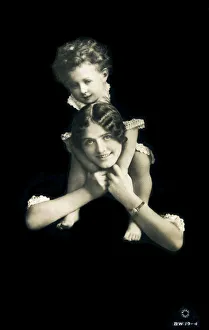 Images Dated 1st March 2019: Mother with her young son carried on her shoulders