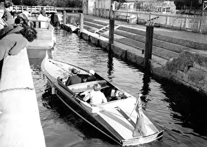 Motorboat at a canal lock in England