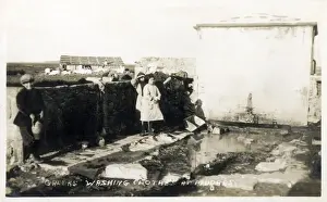 Lemnos Prints: Moudros, Lemnos, Greece - Laundry in the open air - washing clothes by rubbing the garments against large stones