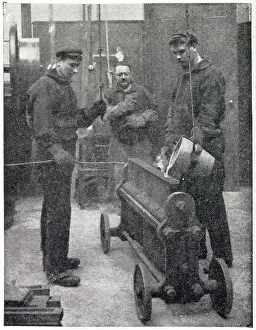 Coinage Prints: Moulders pouring hot liquid silver into long bars twenty inches long. Date: 1904