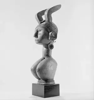 Influential Prints: A Mounted African Wooden carving