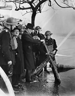 Mr Attlee attending hosepipe tests at Wimbledon, WW2