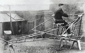Mr a H Watts Sitting on the Bare Structure of His Man-Po?