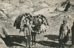Pannier Prints: Mules carry children in pannier seats