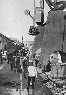 Munitions being loaded onto battleship, WW1