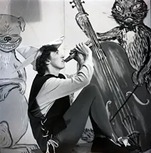 Musician in costume at an Arts Ball