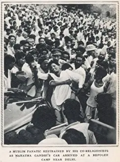 Partition Prints: Muslim fanatic restrained at refugee camp
