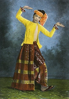 Images Dated 11th August 2015: Myanmar - A Burmese dancer striking a pose