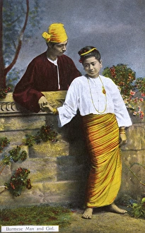 Images Dated 11th August 2015: Myanmar - Couple holding hands over a low wall