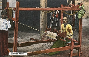 Images Dated 11th August 2015: Myanmar - A weaver at work using a wooden frame loom