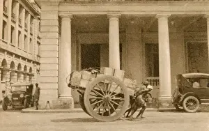 Spoked Prints: Myanmar - Yangon - Street porters pull a large laden wagon
