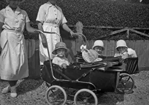 Childcare Prints: Nannies with children in pushchairs
