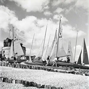 Coasts Collection: National 12 sailing dinghies on a Devon beach