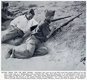 Forage Prints: Two Nationalist volunteers reloading their rifles as they fire at a Republican position near San Sebastian