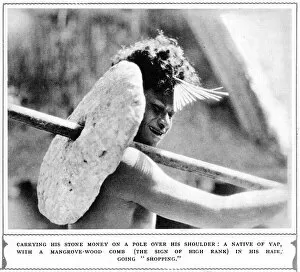 Societies Collection: Native of Yap carrying stone money