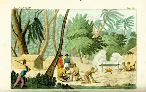 Natives grilling fish on Rawak Island near