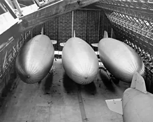 Capable Prints: Four US Navy Goodyear K-Series airships in a hangar