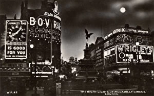 Nightime Gallery: The neon lights of Piccadilly Circus at night, London