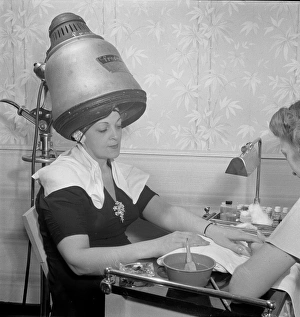Francois Collection: New York, New York. Getting a manicure while drying hair at