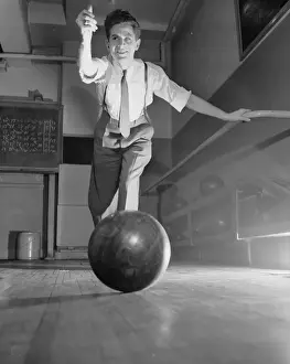 Fifty Prints: New York, New York. Thomas Gilmartin is seen bowling